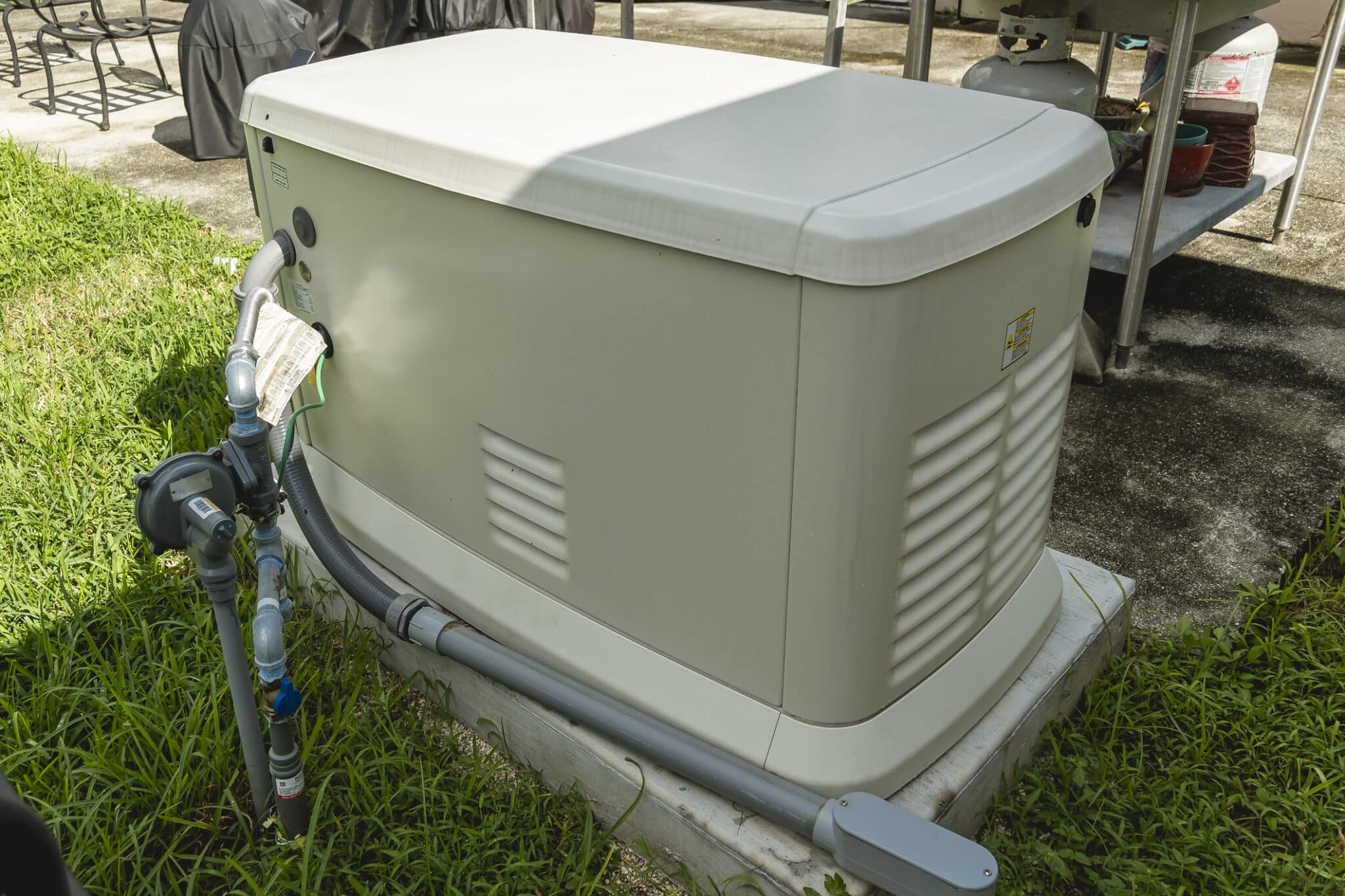 Liquid-Cooled Vs Air-Cooled Home Generators install in backyard.