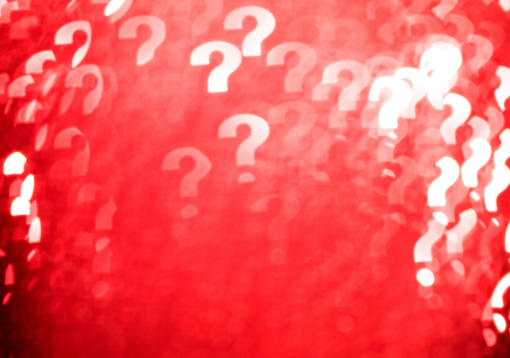 Red and white question marks for FAQ about generator services