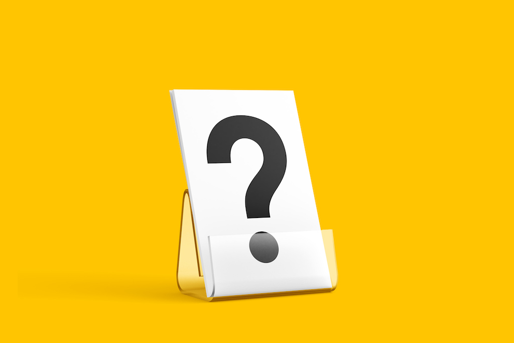 Yellow background with white piece of paper and large black question mark. Questions about generator services.