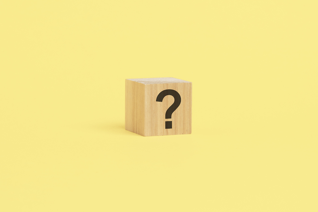 Wood block with question mark and yellow background. | Generator Services