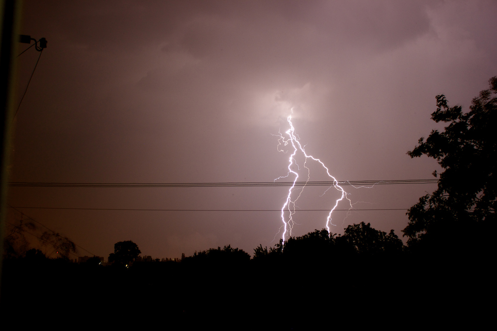 Lightning strikes a power line causing a power outage. In need of generator services in Carolina Shores, NC.